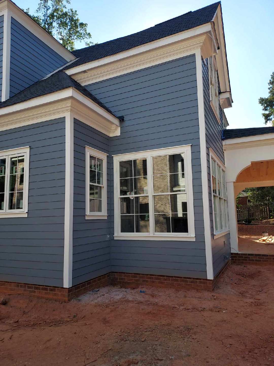 Exterior house painting — siding and trim